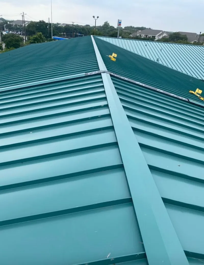 Green commercial metal roof ridge and valley for Metal Roof Repair in Potomac Park